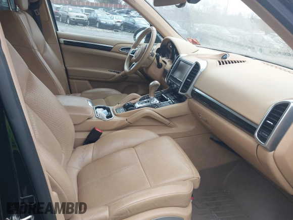 2016 Porsche Cayenne with VIN WP1AA2A28GLA06519, listed as a IAAI auction lot 41520326 with 144,828 mi miles. Bid and sale history available at carsss.com. Image 5.