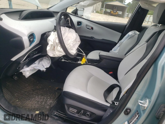 2017 Toyota Prius Two z VIN JTDKARFU9H3031195, wystawiony jako Copart lot #56852615 z przebiegiem 56 481 mil mil oraz Szkoda całkowita • Salvage title. Historia ofert i sprzedaży dostępna na DreamBid. Obrazek 7.