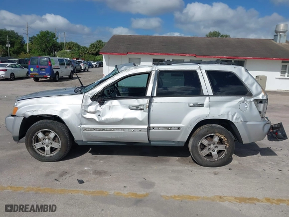 2007 Jeep Grand Cherokee Laredo with VIN 1J8GS48K57C545151, listed as a IAAI auction lot 41959178 with 148,534 mi miles. Bid and sale history available at carsss.com. Image 14.