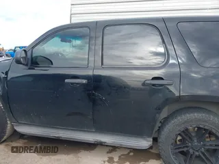 2011 Chevrolet Tahoe Commercial with VIN 1GNLC2E00BR325388, listed as a IAAI auction lot 41472731 with 265,781 mi miles and . Bid and sale history available at DreamBid. Image 15.