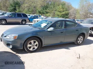 2006 Pontiac Grand Prix z VIN 2G2WP552061225680, wystawiony jako IAAI lot #42221115 z przebiegiem 186 924 mil mil oraz . Historia ofert i sprzedaży dostępna na DreamBid. Obrazek 14.