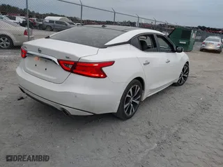 2018 Nissan Maxima SL with VIN 1N4AA6AP7JC371792, listed as a IAAI auction lot 41285671 with 137,517 mi miles. Bid and sale history available at carsss.com. Image 4.