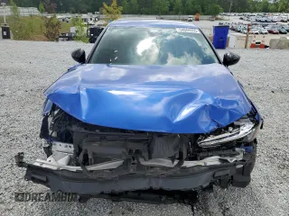 2023 Honda Civic Sport z VIN 2HGFE2F58PH546627, wystawiony jako Copart lot #54944555 z przebiegiem 22 987 mil mil oraz Szkoda całkowita • Salvage title. Historia ofert i sprzedaży dostępna na DreamBid. Obrazek 5.
