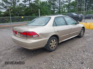 2002 Honda Accord EX z VIN 1HGCG56632A133738, wystawiony jako IAAI lot #42104355 z przebiegiem 236 202 mil mil oraz . Historia ofert i sprzedaży dostępna na DreamBid. Obrazek 4.