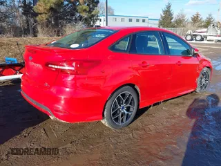 2015 Ford Focus SE with VIN 1FADP3F24FL367357, listed as a IAAI auction lot 41638693 with 107,379 mi miles. Bid and sale history available at carsss.com. Image 4.