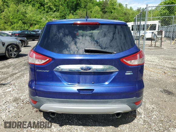 2013 Ford Escape SEL z VIN 1FMCU9HX7DUB98268, wystawiony jako Copart lot #55469915 z przebiegiem 123 619 mil mil oraz Szkoda całkowita • Salvage title. Historia ofert i sprzedaży dostępna na DreamBid. Obrazek 6.