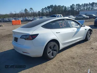 2022 Tesla Model 3 with VIN 5YJ3E1EA5NF315004, listed as a IAAI auction lot 41429800 with Not Provided miles. Bid and sale history available at carsss.com. Image 4.