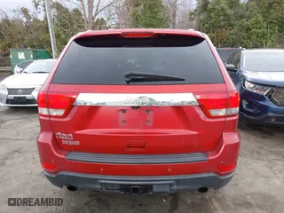2011 Jeep Grand Cherokee Laredo with VIN 1J4RR4GT8BC636651, listed as a IAAI auction lot 41768944 with 200,160 mi miles. Bid and sale history available at carsss.com. Image 16.