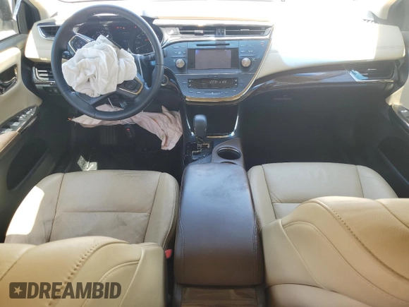 2014 Toyota Avalon Limited z VIN 4T1BK1EB4EU089540, wystawiony jako Copart lot #56886765 z przebiegiem 88 278 mil mil oraz Szkoda całkowita • Salvage title. Historia ofert i sprzedaży dostępna na DreamBid. Obrazek 8.