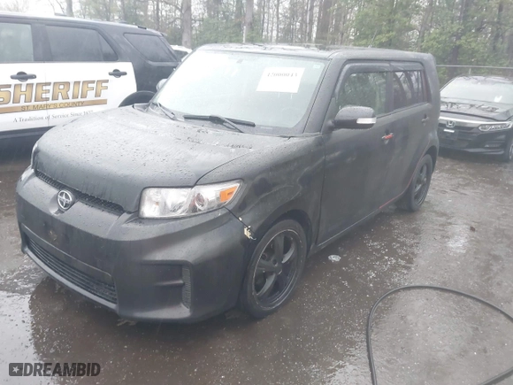 2012 Scion xB with VIN JTLZE4FE3CJ008728, listed as a IAAI auction lot 42000043 with 172,199 mi miles. Bid and sale history available at carsss.com. Image 17.