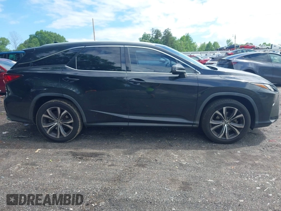 2018 Lexus RX 350L Premium z VIN JTJGZKCA2J2002663, wystawiony jako IAAI lot #42240476 z przebiegiem 159 429 mil mil oraz . Historia ofert i sprzedaży dostępna na DreamBid. Obrazek 13.
