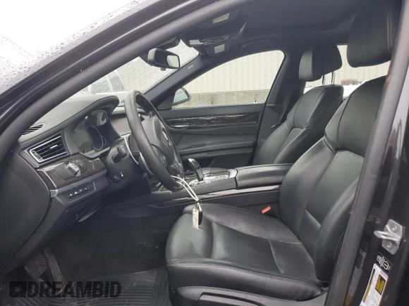 2015 BMW 7 Series 740Li xDrive with VIN WBAYF4C51FGS99169, listed as a Copart auction lot 37415003 with 82,826 mi miles. Bid and sale history available at carsss.com. Image 7.