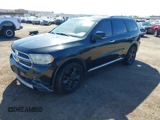 2013 Dodge Durango Crew with VIN 1C4RDHDG6DC508785, listed as a IAAI auction lot 41820911 with 186,359 mi miles. Bid and sale history available at carsss.com. Image 2.