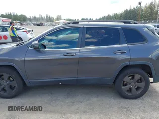 2016 Jeep Cherokee Latitude z VIN 1C4PJMCB9GW293047, wystawiony jako IAAI lot #42325392 z przebiegiem 127 706 mil mil oraz . Historia ofert i sprzedaży dostępna na DreamBid. Obrazek 15.