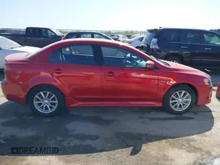 2016 Mitsubishi Lancer ES z VIN JA32U2FU3GU001857, wystawiony jako IAAI lot #41999674 z przebiegiem 65 520 mil mil oraz . Historia ofert i sprzedaży dostępna na DreamBid. Obrazek 13.