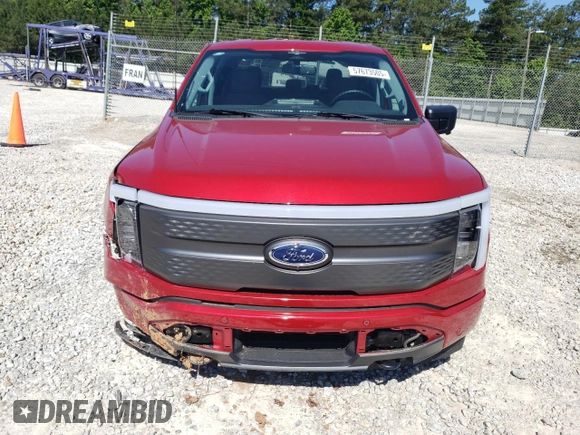 2023 Ford F-150 Lightning Pro z VIN 1FTVW1EL5PWG08844, wystawiony jako Copart lot #57673505 z przebiegiem 20 001 mil mil oraz Szkoda całkowita • Salvage title. Historia ofert i sprzedaży dostępna na DreamBid. Obrazek 5.