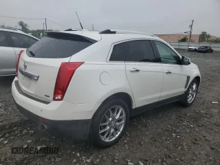 2013 Cadillac SRX Performance Collection with VIN 3GYFNHE34DS597871, listed as a Copart auction lot 56470795 with 208,504 mi miles and Salvage title. Bid and sale history available at DreamBid. Image 3.