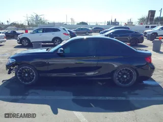 2016 BMW 2 Series 228i with VIN WBA1F9C59GV742583, listed as a IAAI auction lot 41470959 with 71,191 mi miles. Bid and sale history available at carsss.com. Image 14.