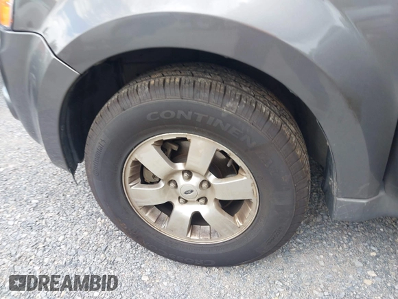2011 Ford Escape Limited with VIN 1FMCU0E7XBKC69410, listed as a IAAI auction lot 42458547 with 126,022 mi miles and . Bid and sale history available at DreamBid. Image 12.