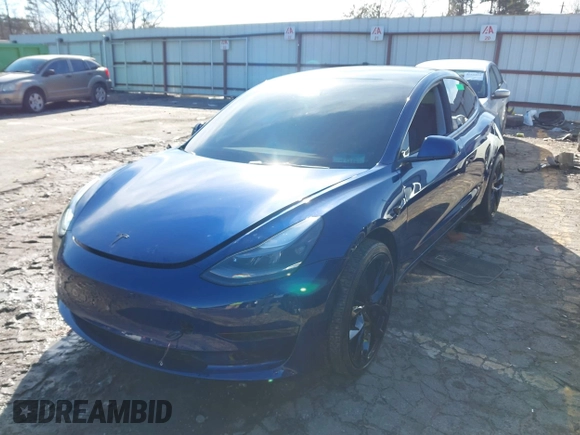 2023 Tesla Model 3 Long Range with VIN 5YJ3E1EB0PF688172, listed as a IAAI auction lot 41411580 with 21,125 mi miles and . Bid and sale history available at DreamBid. Image 2.