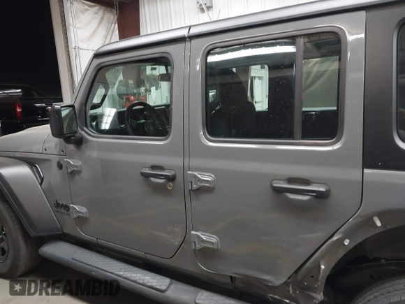 2022 Jeep Wrangler Unlimited Sport with VIN 1C4HJXDG0NW117632, listed as a IAAI auction lot 41185850 with 18,298 mi miles and . Bid and sale history available at DreamBid. Image 14.
