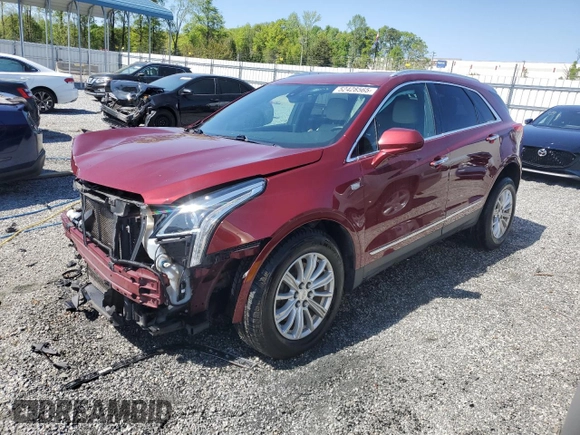 2018 Cadillac XT5 FWD with VIN 1GYKNARS1JZ205595, listed as a Copart auction lot 52428565 with 106,927 mi miles and Salvage title. Bid and sale history available at DreamBid. Image 1.
