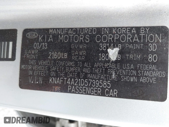2013 Kia Forte LX with VIN KNAFT4A21D5739585, listed as a IAAI auction lot 42097213 with 195,500 mi miles. Bid and sale history available at carsss.com. Image 9.