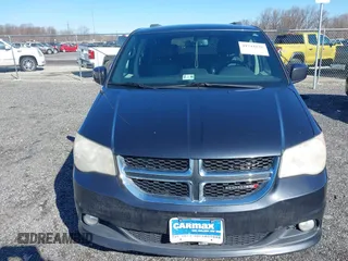2014 Dodge Grand Caravan SXT with VIN 2C4RDGCG3ER339491, listed as a IAAI auction lot 41744826 with 146,757 mi miles and . Bid and sale history available at DreamBid. Image 12.