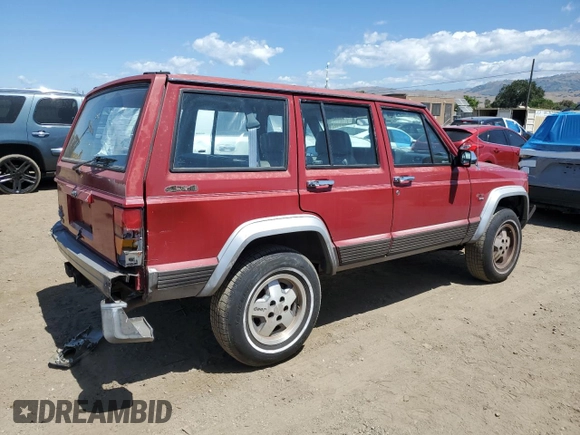 1992 Jeep Cherokee with VIN 1J4FJ58S0NL140995, listed as a Copart auction lot 56705875 with 253,657 mi miles and Salvage title. Bid and sale history available at DreamBid. Image 3.