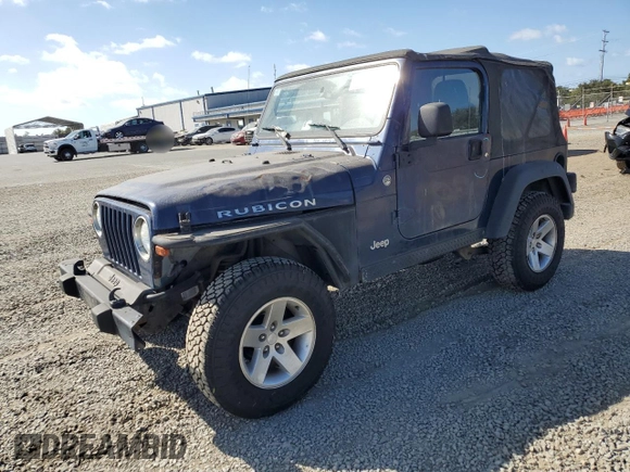 2005 Jeep Wrangler Rubicon with VIN 1J4FA69S05P351725, listed as a Copart auction lot 71411904 with 144,557 mi miles and Salvage Title. Bid and sale history available at carsss.com. Image 1.