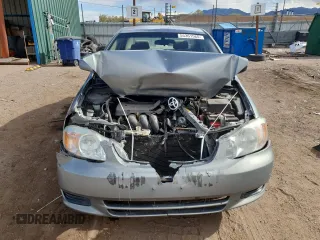 2004 Toyota Corolla CE with VIN 1NXBR38E44Z310906, listed as a Copart auction lot 55361565 with 186,022 mi miles and Salvage Title. Bid and sale history available at DreamBid. Image 5.