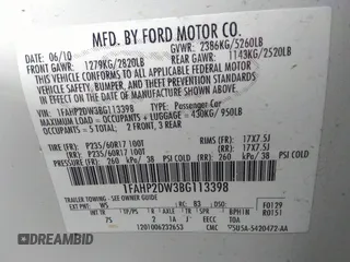 2011 Ford Taurus SE with VIN 1FAHP2DW3BG113398, listed as a IAAI auction lot 41617959 with 123,706 mi miles. Bid and sale history available at carsss.com. Image 9.