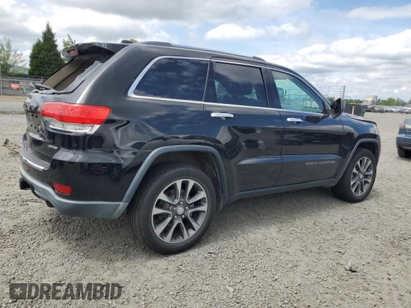 2018 Jeep Grand Cherokee Limited with VIN 1C4RJFBG8JC106374, listed as a Copart auction lot 58212965 with 61,813 mi miles and Salvage title. Bid and sale history available at DreamBid. Image 3.