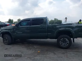 2021 Toyota Tacoma 4WD SR5 with VIN 3TMDZ5BN0MM116198, listed as a IAAI auction lot 41445815 with 59,561 mi miles. Bid and sale history available at carsss.com. Image 15.