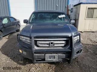 2010 Honda Ridgeline RTL with VIN 5FPYK1F58AB006922, listed as a Copart auction lot 44967355 with 202,067 mi miles and Salvage Title. Bid and sale history available at carsss.com. Image 5.