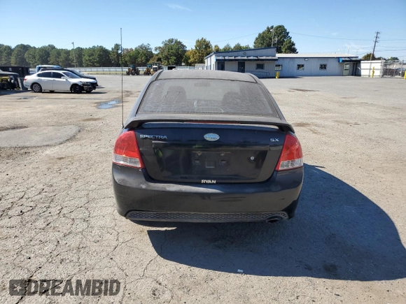2009 Kia Spectra SX with VIN KNAFE221895022564, listed as a Copart auction lot 76997864 with 189,177 mi miles and Salvage Title. Bid and sale history available at carsss.com. Image 6.