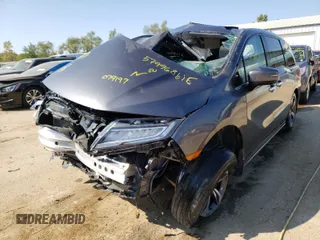2019 Honda Odyssey Touring with VIN 5FNRL6H89KB079197, listed as a Copart auction lot 57996861 with Not provided miles and Non repairable. Bid and sale history available at DreamBid. Image 2.