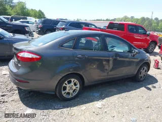 2015 Ford Fiesta SE with VIN 3FADP4BJ6FM219115, listed as a IAAI auction lot 42035656 with 146,845 mi miles. Bid and sale history available at carsss.com. Image 6.
