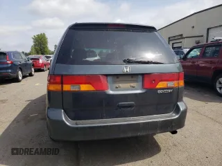 2003 Honda Odyssey EX-L z VIN 5FNRL18053B123100, wystawiony jako Copart lot #54159715 z przebiegiem 232 206 mil mil oraz Szkoda całkowita • Salvage title. Historia ofert i sprzedaży dostępna na DreamBid. Obrazek 6.