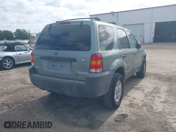 2007 Ford Escape XLT with VIN 1FMYU03187KA16422, listed as a IAAI auction lot 42168052 with 189,757 mi miles and . Bid and sale history available at DreamBid. Image 4.