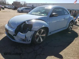 2014 Volkswagen Beetle Turbo R-Line with VIN 3VWVT7AT1EM639374, listed as a Copart auction lot 50230785 with 54,818 mi miles and Salvage Title. Bid and sale history available at DreamBid. Image 1.