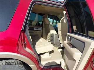 2014 Ford Expedition King Ranch with VIN 1FMJU1J57EEF02096, listed as a IAAI auction lot 42298251 with 144,724 mi miles and . Bid and sale history available at DreamBid. Image 8.