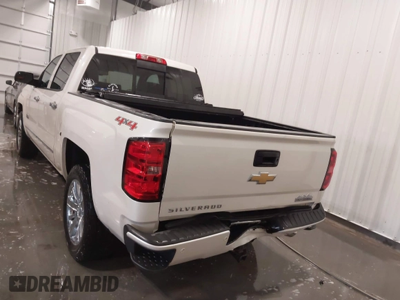 2014 Chevrolet Silverado 1500 High Country with VIN 3GCUKTEC4EG527722, listed as a IAAI auction lot 41978841 with 104,492 mi miles and . Bid and sale history available at DreamBid. Image 16.