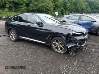 2020 BMW X4 xDrive30i with VIN 5UX2V1C06L9B74345, listed as a Copart auction lot 57495183 with 0 mi miles. Bid and sale history available at carsss.com. Image 4.