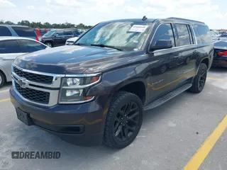 2015 Chevrolet Suburban LT z VIN 1GNSKJKC9FR245097, wystawiony jako IAAI lot #42468168 z przebiegiem 198 454 mil mil oraz . Historia ofert i sprzedaży dostępna na DreamBid. Obrazek 18.