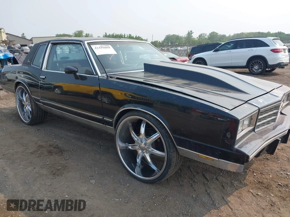 1984 Chevrolet Monte Carlo z VIN 1G1AZ37H9ER201513, wystawiony jako IAAI lot #42416804 z przebiegiem 80 467 mil mil oraz . Historia ofert i sprzedaży dostępna na DreamBid. Obrazek 1.