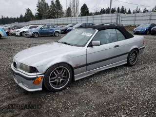 1999 BMW 3 Series 328ic with VIN WBABK7331XET68084, listed as a Copart auction lot 86205884 with 0 mi miles and Salvage Title. Bid and sale history available at carsss.com. Image 1.