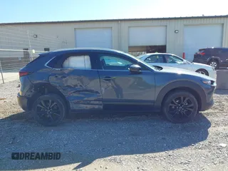 2023 Mazda CX-30 2.5 S Carbon Edition with VIN 3MVDMBCM5PM528946, listed as a IAAI auction lot 41882936 with 62,815 mi miles. Bid and sale history available at carsss.com. Image 13.