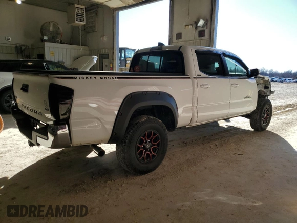 2021 Toyota Tacoma 4WD SR5 with VIN 3TMDZ5BN4MM103311, listed as a Copart auction lot 46486445 with 125,685 mi miles and Salvage Title. Bid and sale history available at carsss.com. Image 3.