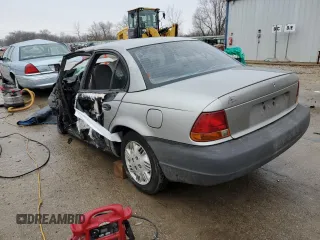 1998 Saturn SL z VIN 1G8ZG5288WZ306574, wystawiony jako Copart lot #86627384 z przebiegiem Nie podano mil oraz Nie do naprawy. Historia ofert i sprzedaży dostępna na DreamBid. Obrazek 2.